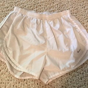 White Nike dryfit exercise shorts.